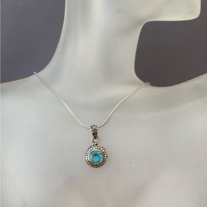 Sterling silver necklace round blue crystal pendant